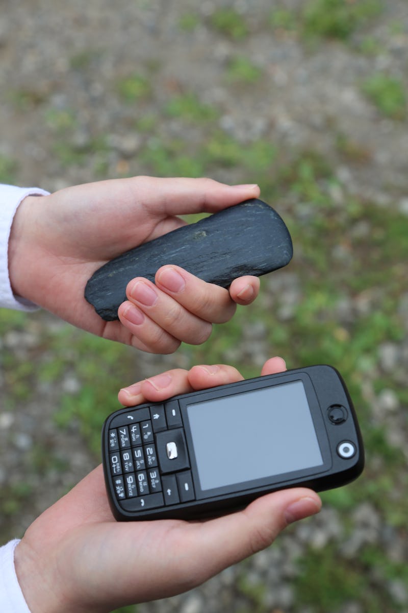 Shimabuku - Instrumental Exchange the mobile phone for a stone tool, 2014.